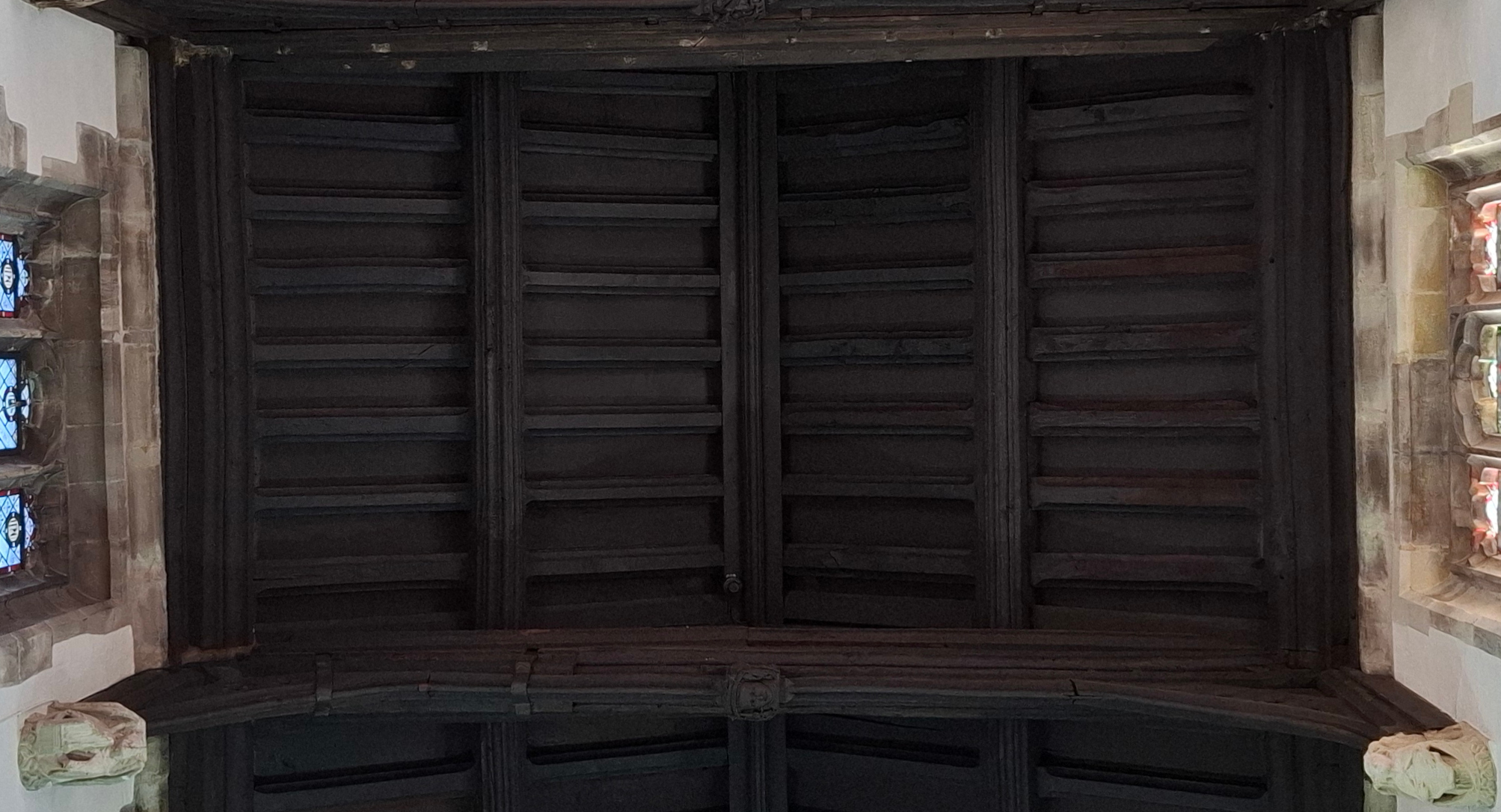 Chancel Bay CH3, displayed west-up, with two stone corbels and a wooden head on the eastern cross beam